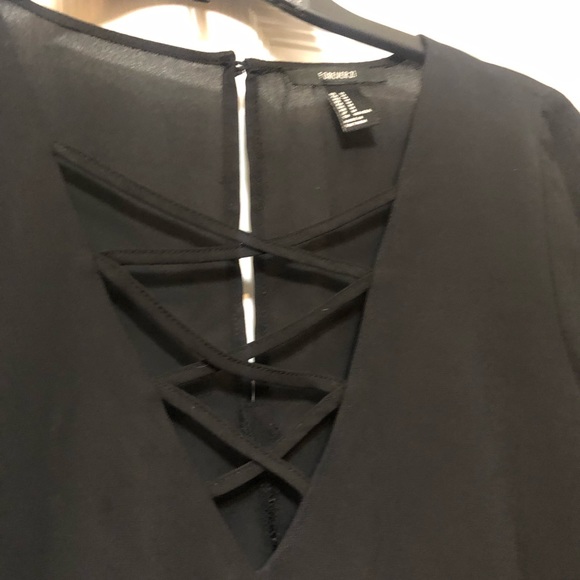 Forever 21 black blouse with cris-cross design in the front and keyhole closure - Picture 2 of 4